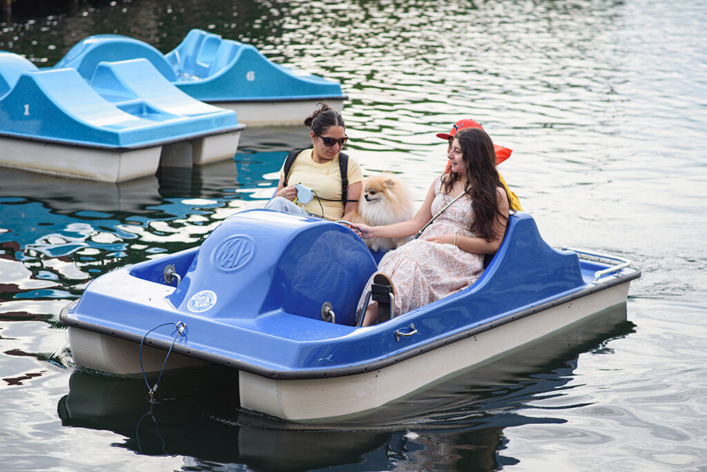 BOOM Charlotte attendees riding paddle boats